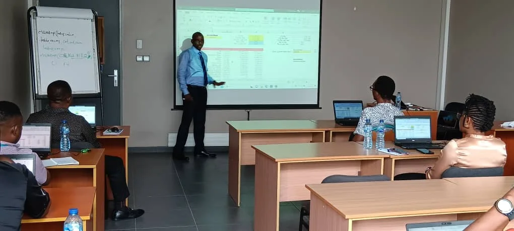 Modern office environment with technology consulting professionals collaborating on digital transformation strategies